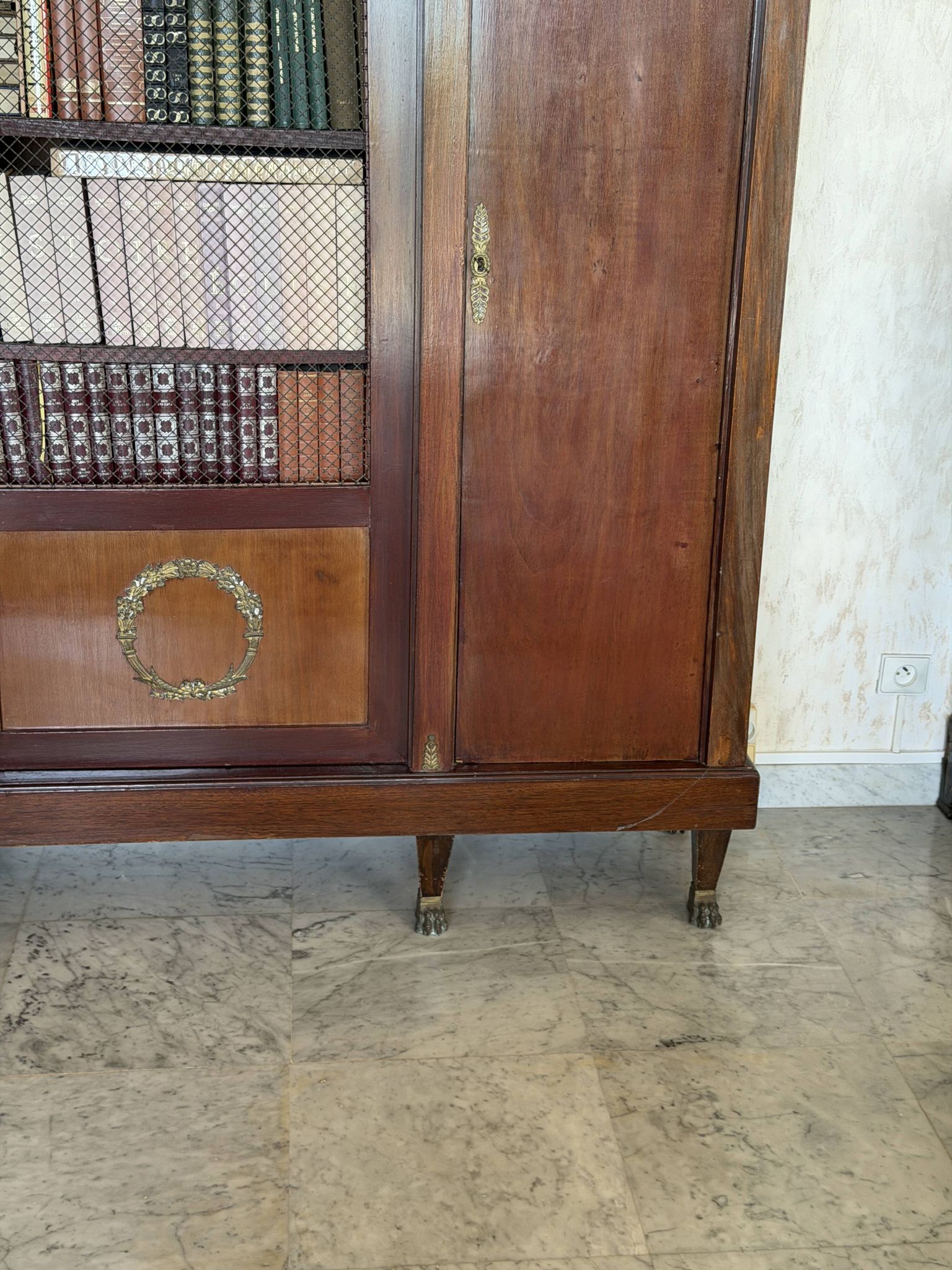 Large antique library from the Empire/Napoleon III period in mahogany and gilded bronze.