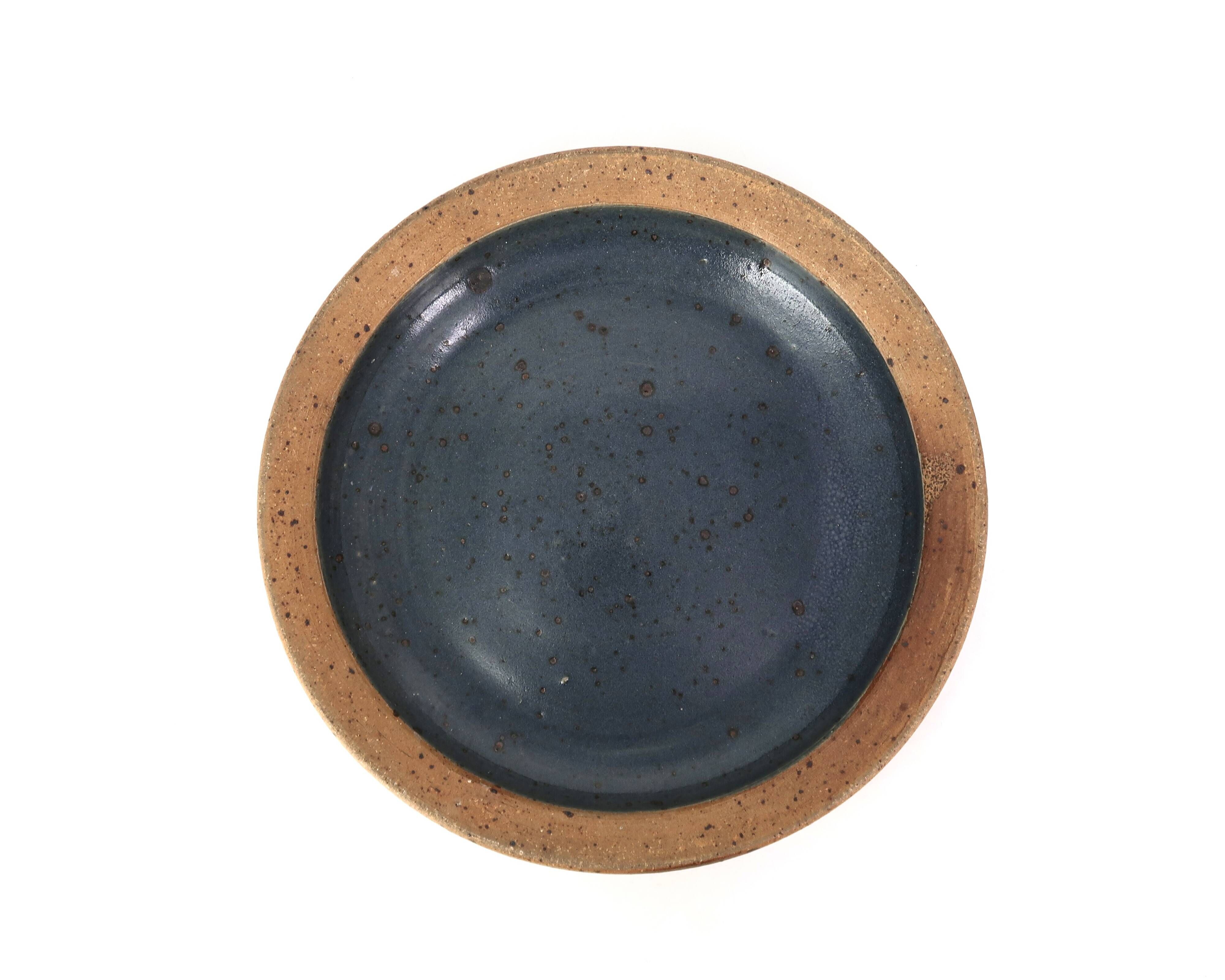 Round hollow plate in stoneware by Pierre Digan, La Borne, blue ceramic from the 1960s.