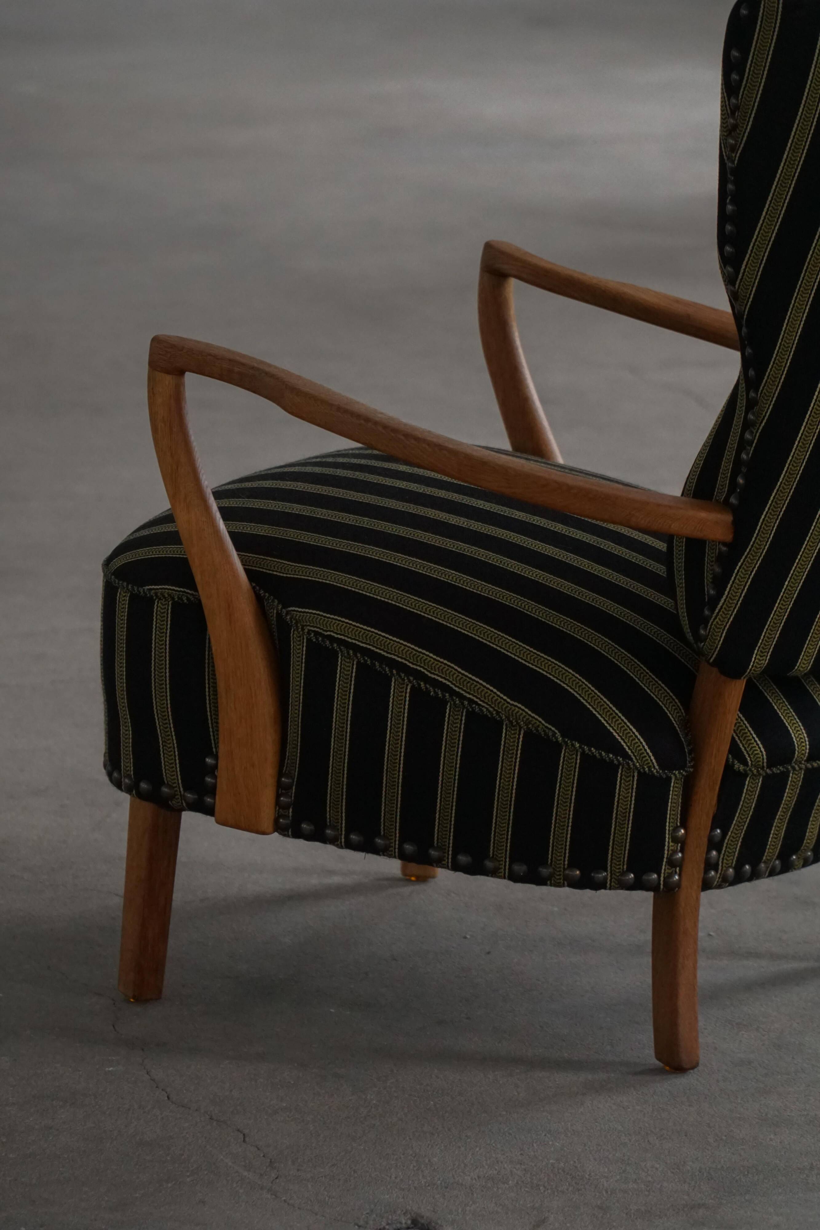 Danish mid-century chaise longue with a convertible backrest in oak, Viggo Boesen, 1950s.
