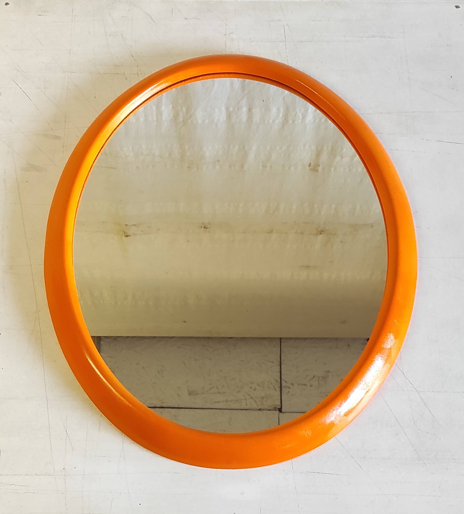 Orange oval mirror - 1970s