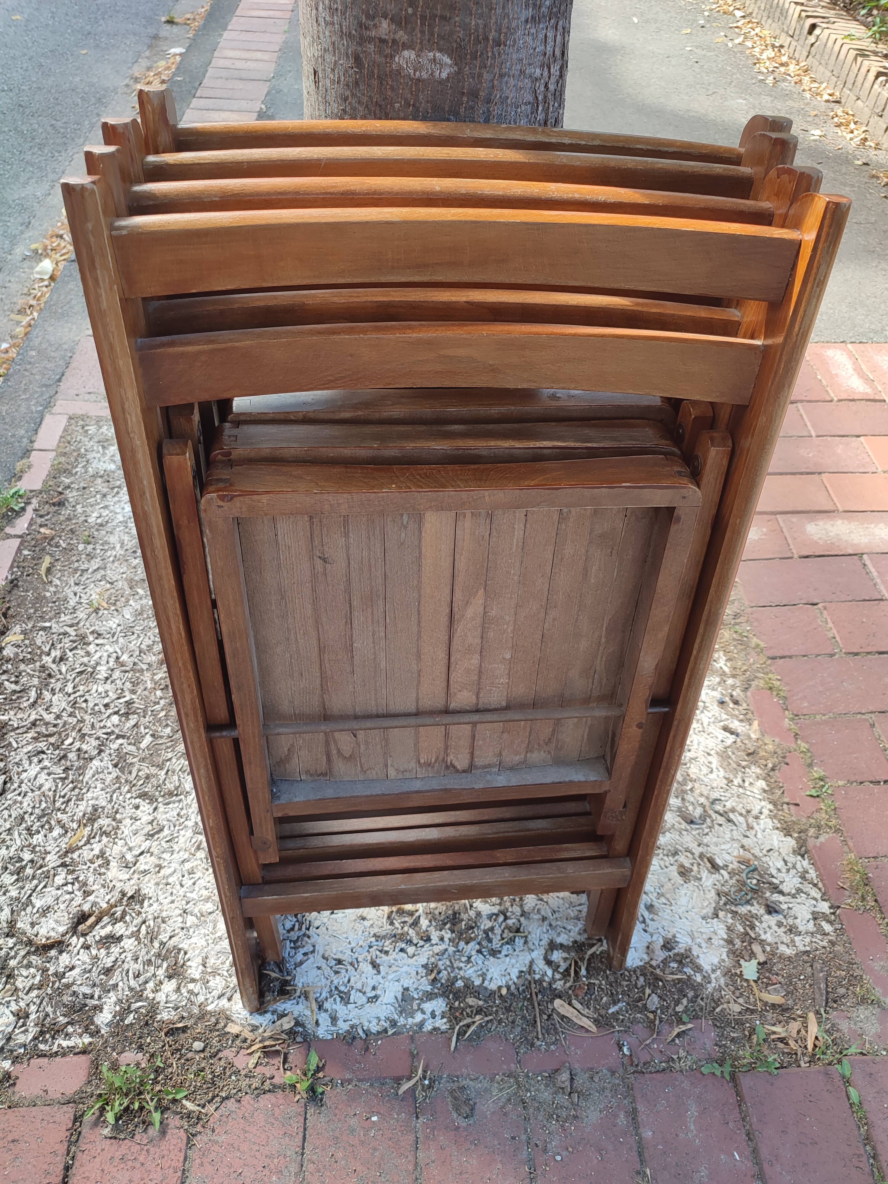 4 folding teak chairs