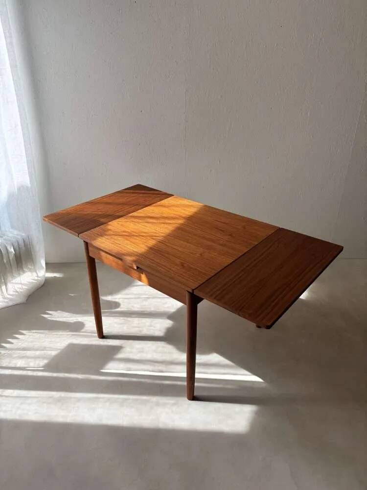 Scandinavian design dining table in solid teak from the 1960s.