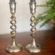 Pair of twisted brass candle holders