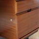 Mahogany veneer desk by Pierre Guariche for Minvielle, 1950s