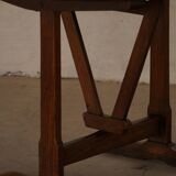 Round table with a tilting top from a 19th-century provincial French winemaker in oak.