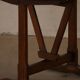 Round table with a tilting top from a 19th-century provincial French winemaker in oak.