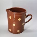 Old pitcher with polka dots savoyard pottery in glazed terracotta alsace