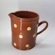 Old pitcher with polka dots savoyard pottery in glazed terracotta alsace