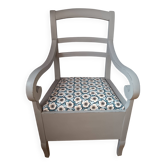 Old commode chair refurbished in gray with floral fabric seat