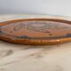 Round glazed earthenware dish by Biot, 20th century, stylized decoration