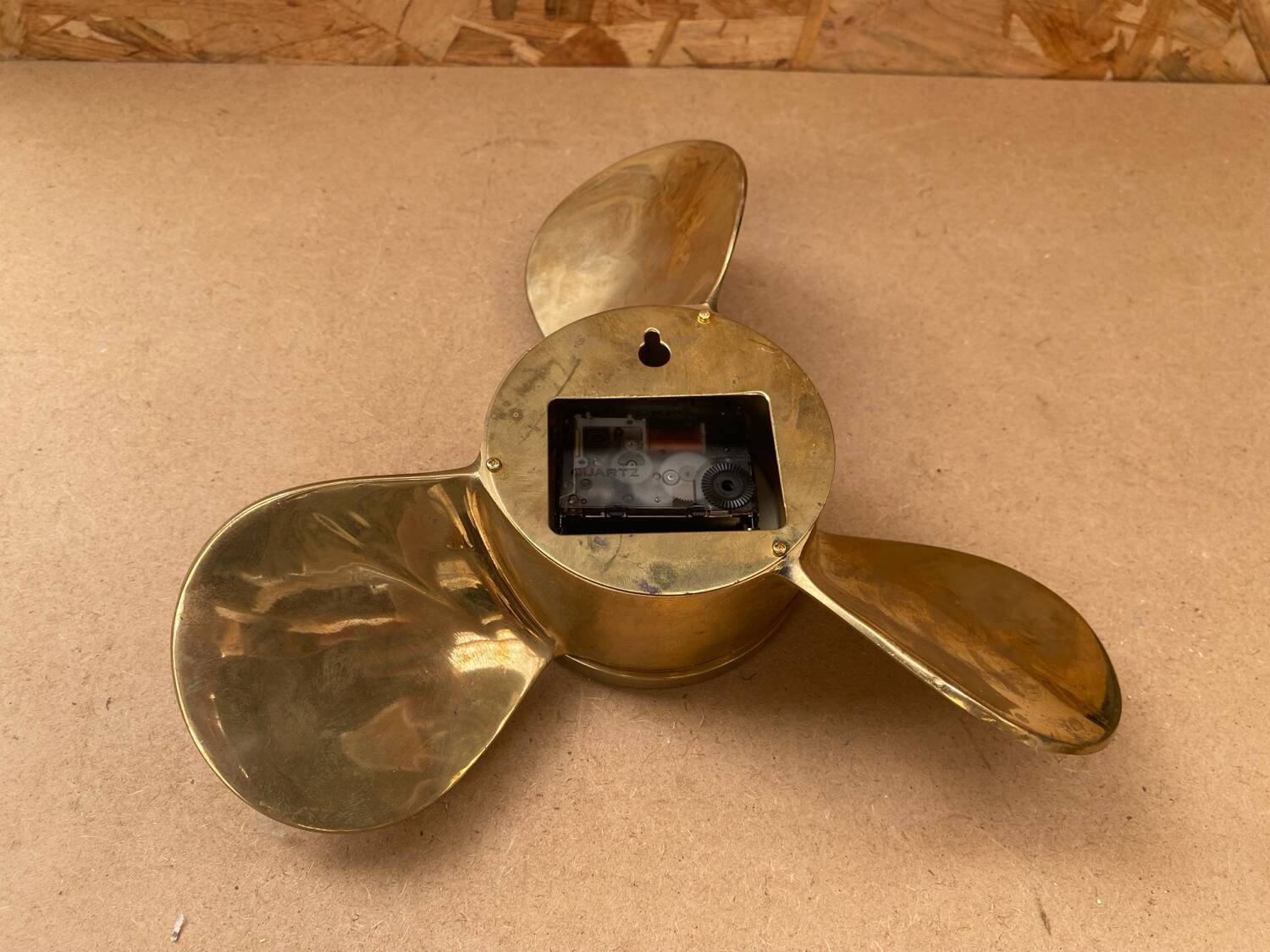 Antique brass propeller with pendulum vintage nautical wall clock