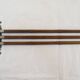 Antique towel rack has three arms