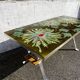 Vintage ceramic coffee table, floral patterns and chrome base.