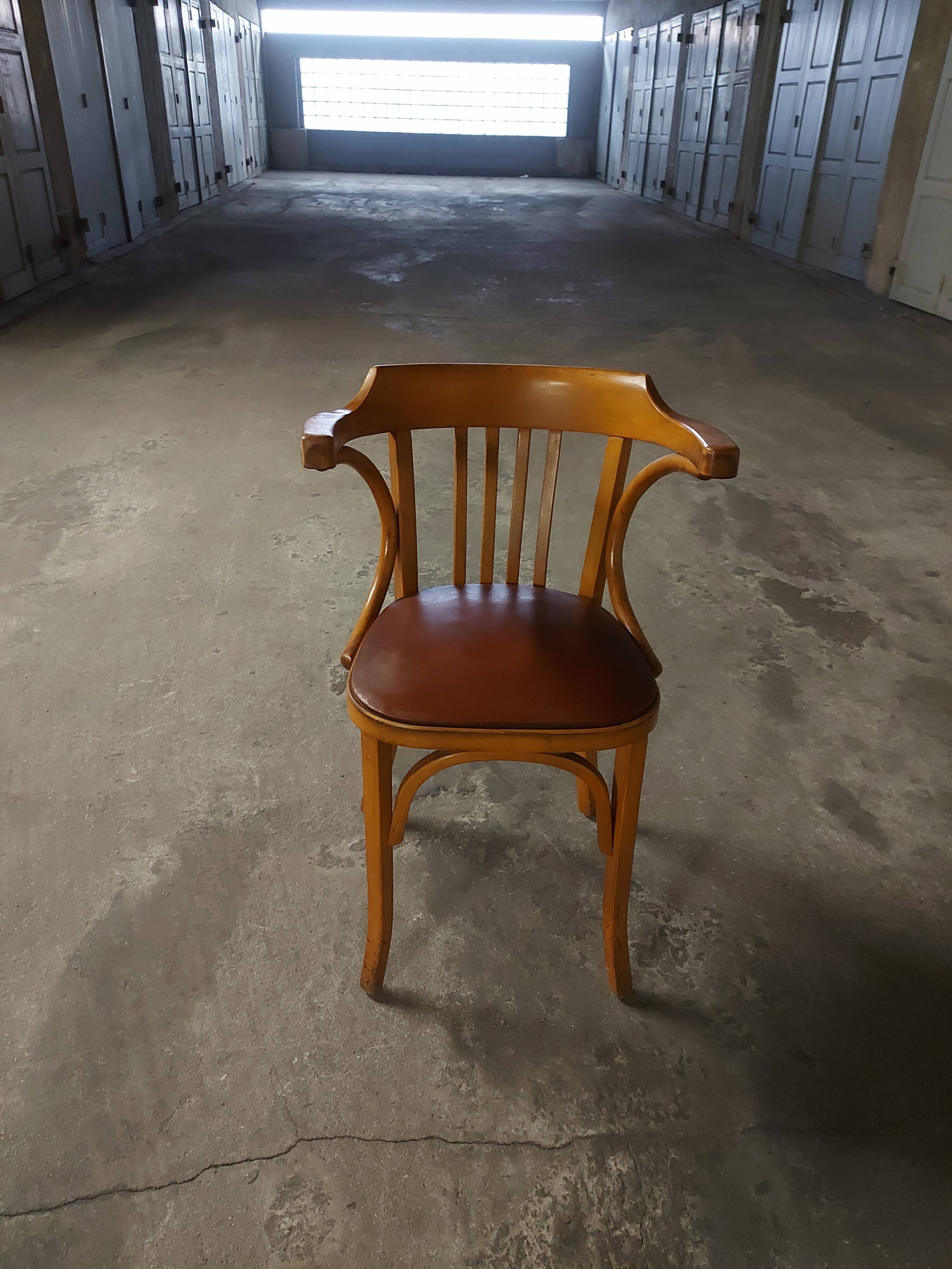 Fauteuil vintage en bois Baumann