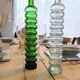 Pair of vintage ribbed blown glass bottles with cork stoppers.