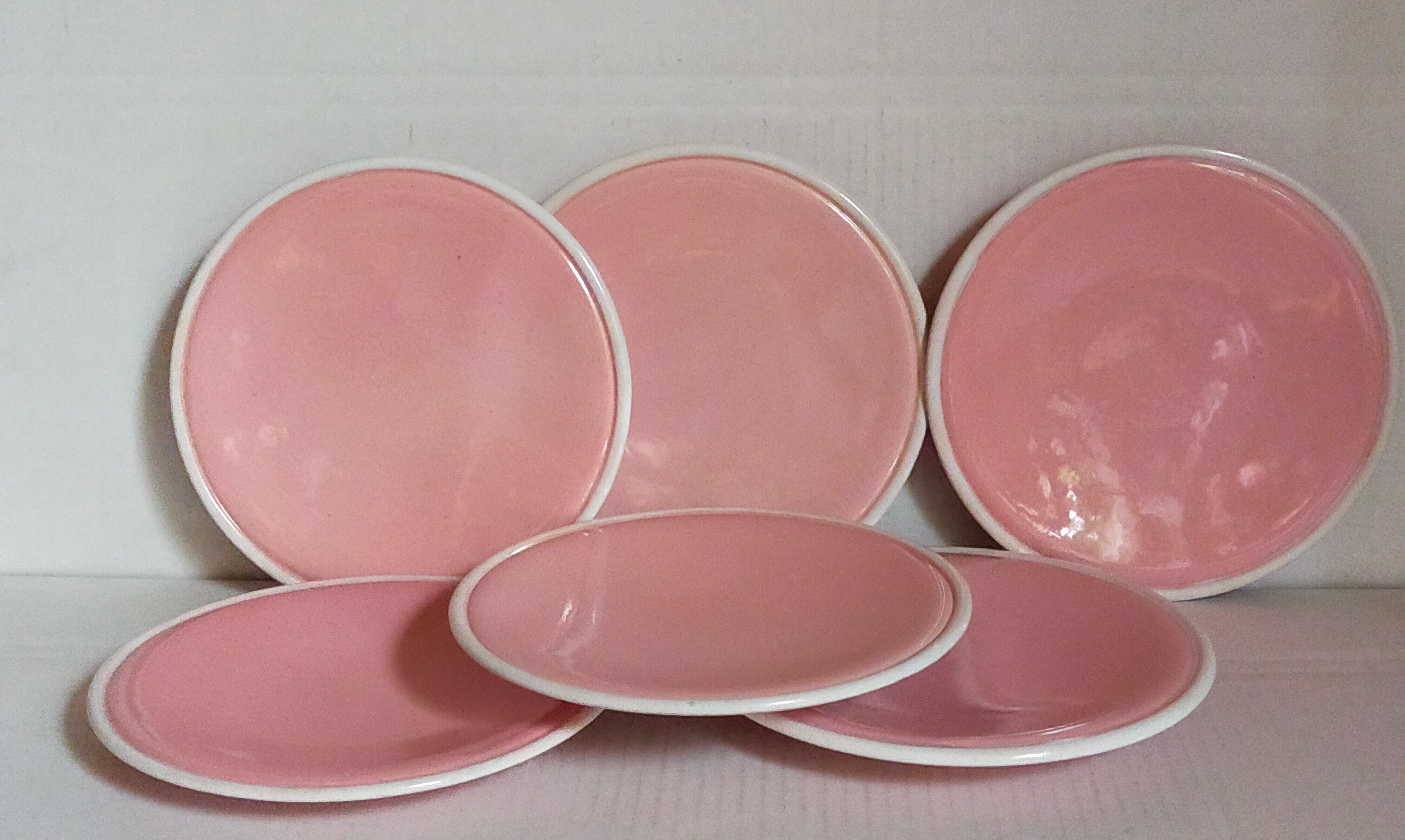 Six old pink earthenware dessert plates