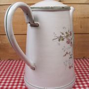 Old coffee maker in enamelled sheet metal brand bb 1900s , decoration of roses , kitchen utensils