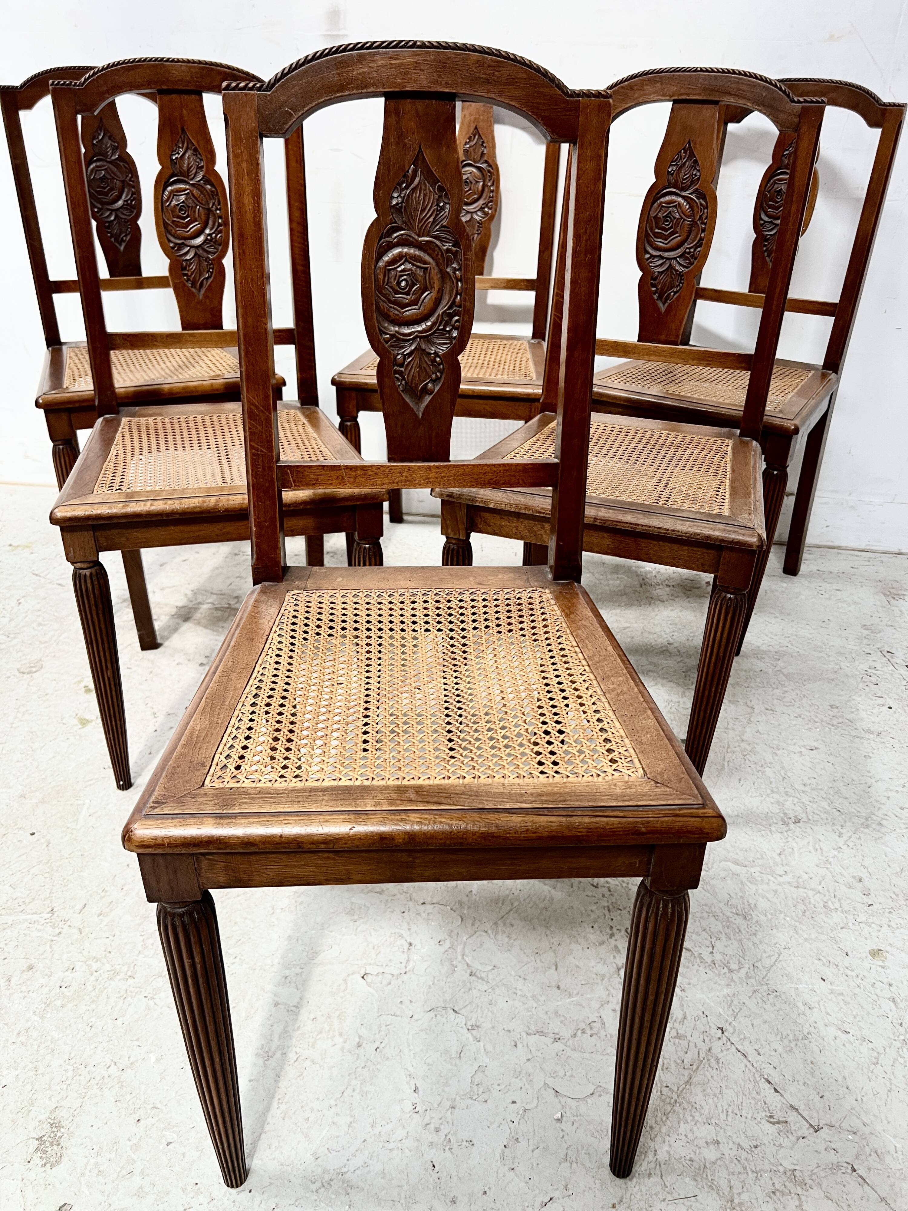 Set of six Art Deco chairs in solid walnut, 20th century.