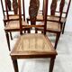 Set of six Art Deco chairs in solid walnut, 20th century.