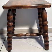 Vintage low stool in solid wood with turned legs – 1950