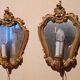 Vintage gold mirror sconces from the late 1950s.