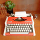 Portable typewriter " Olympia traveller de luxe " , red , in working order