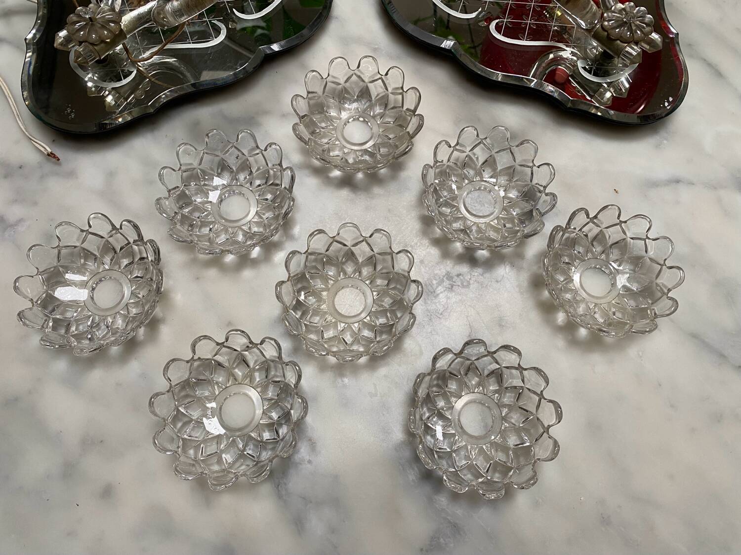 Venetian wall lights with Baccarat crystal mirror.