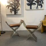 Pair of curule chairs designed by John Vesey, 1958, USA, brushed aluminum, walnut and leather