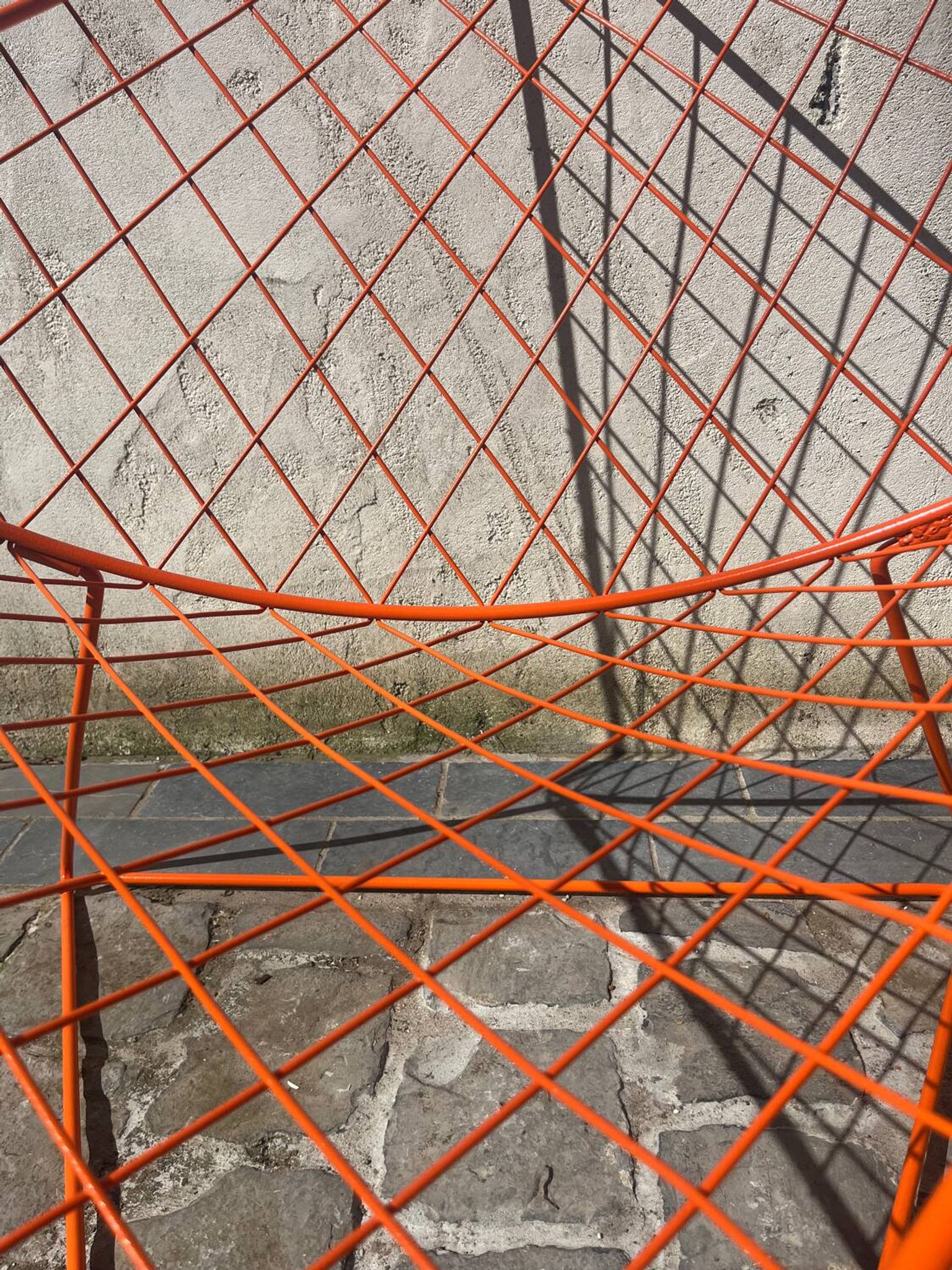 Orange lattice armchair