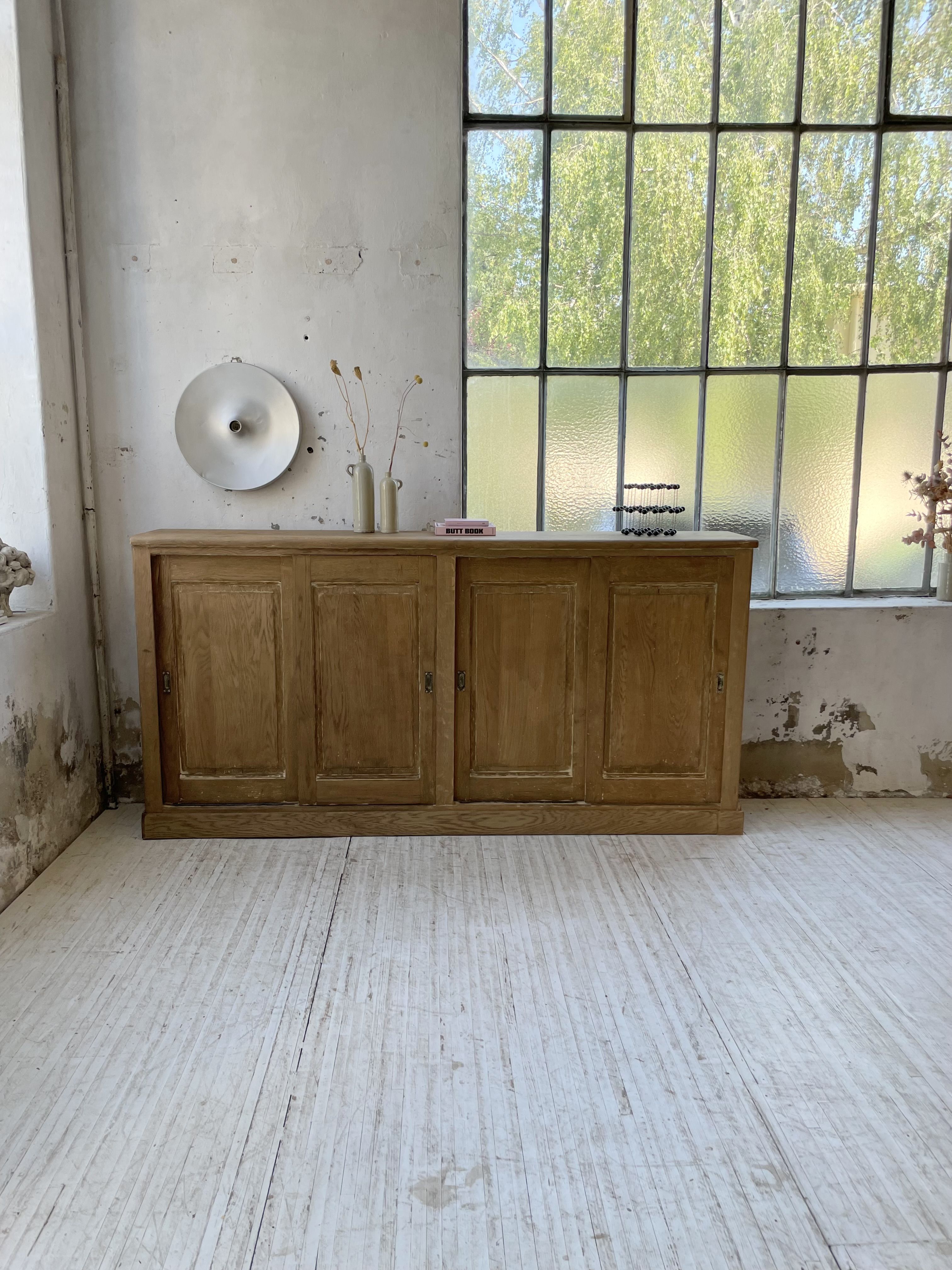 Large row of solid oak loom sliding doors