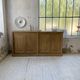 Large row of solid oak loom sliding doors