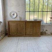 Large row of solid oak loom sliding doors