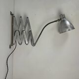 Old large industrial accordion wall lamp