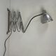 Old large industrial accordion wall lamp