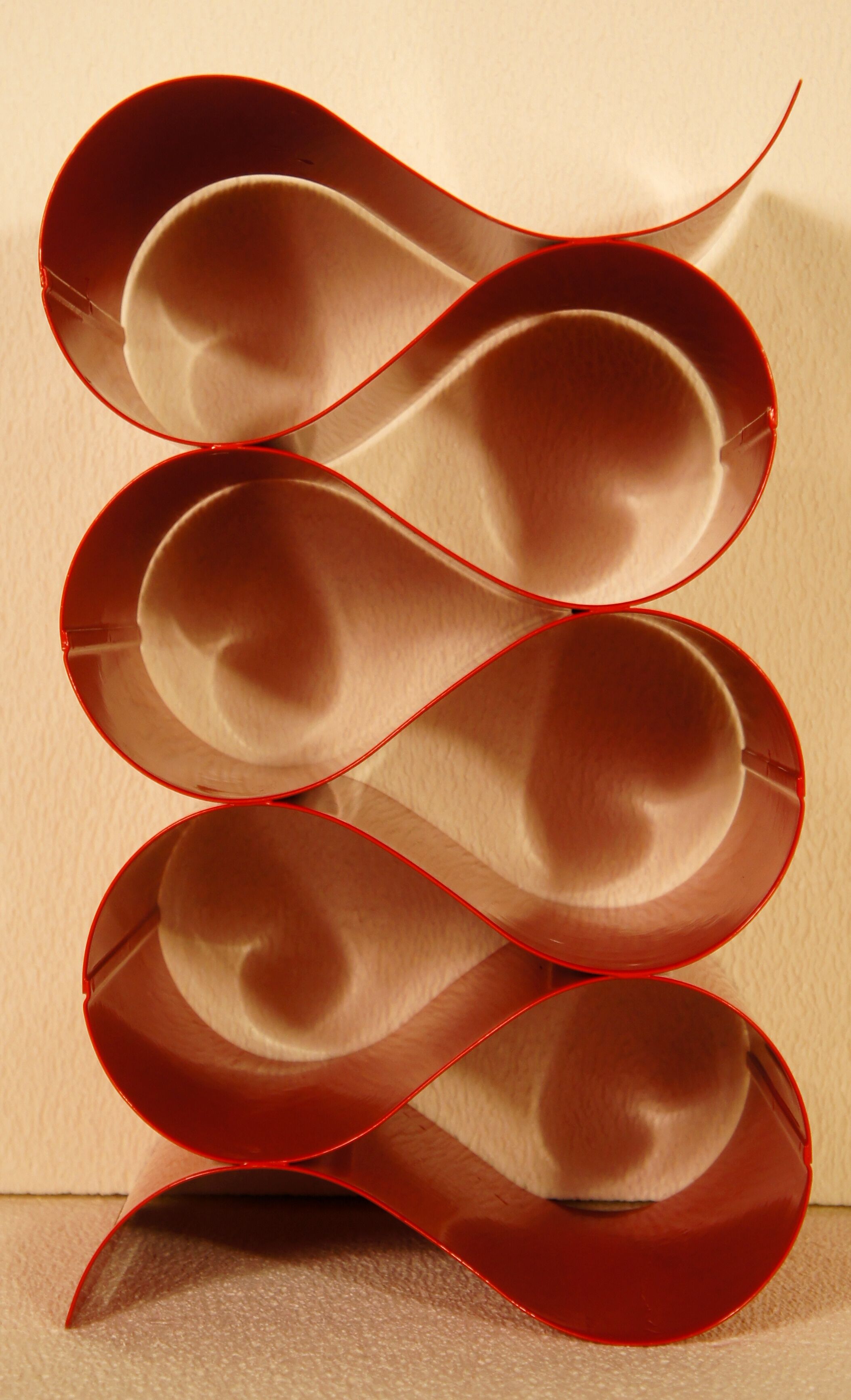 Red lacquered metal bottle holders