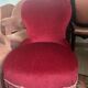 Vintage burgundy velvet armchair with fringes – theatrical and elegant