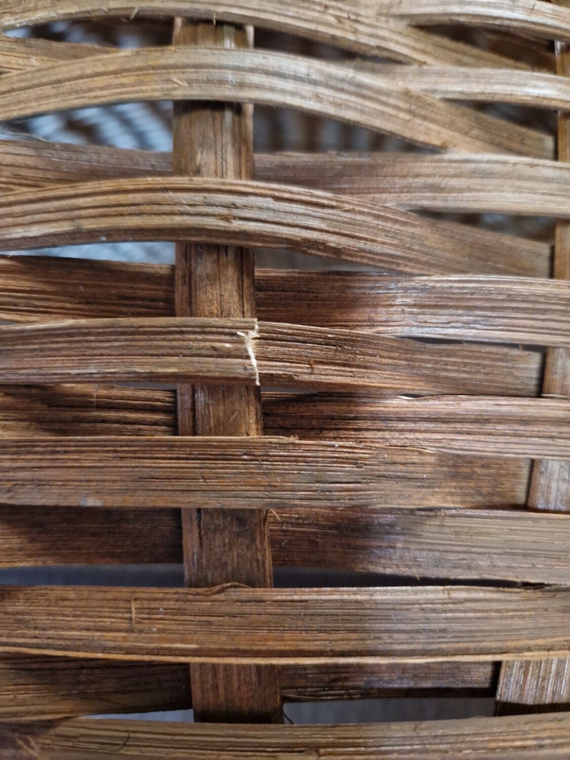 Large vintage metal and wicker armchair