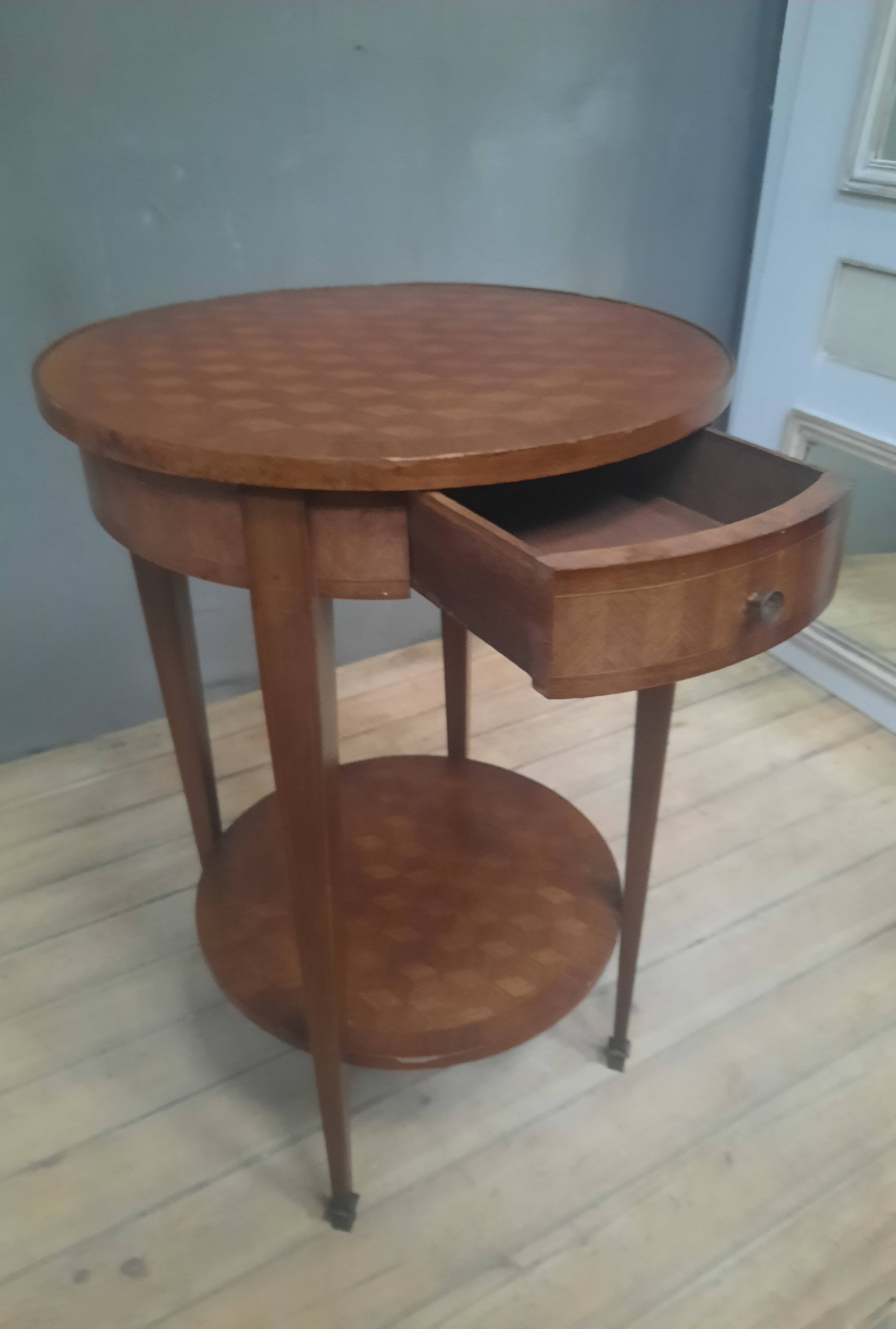 Round marquetry pedestal table with 2 shelves