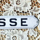 "caisse" enamelled trade plate.