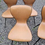 4 vintage chairs in skaï and metal base from the 60s