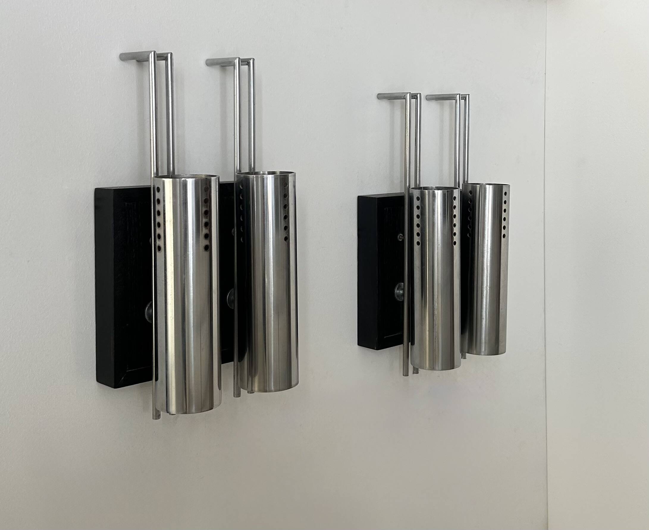 Pair of vintage wall lights, chrome-plated metal and blackened oak, France, 1970