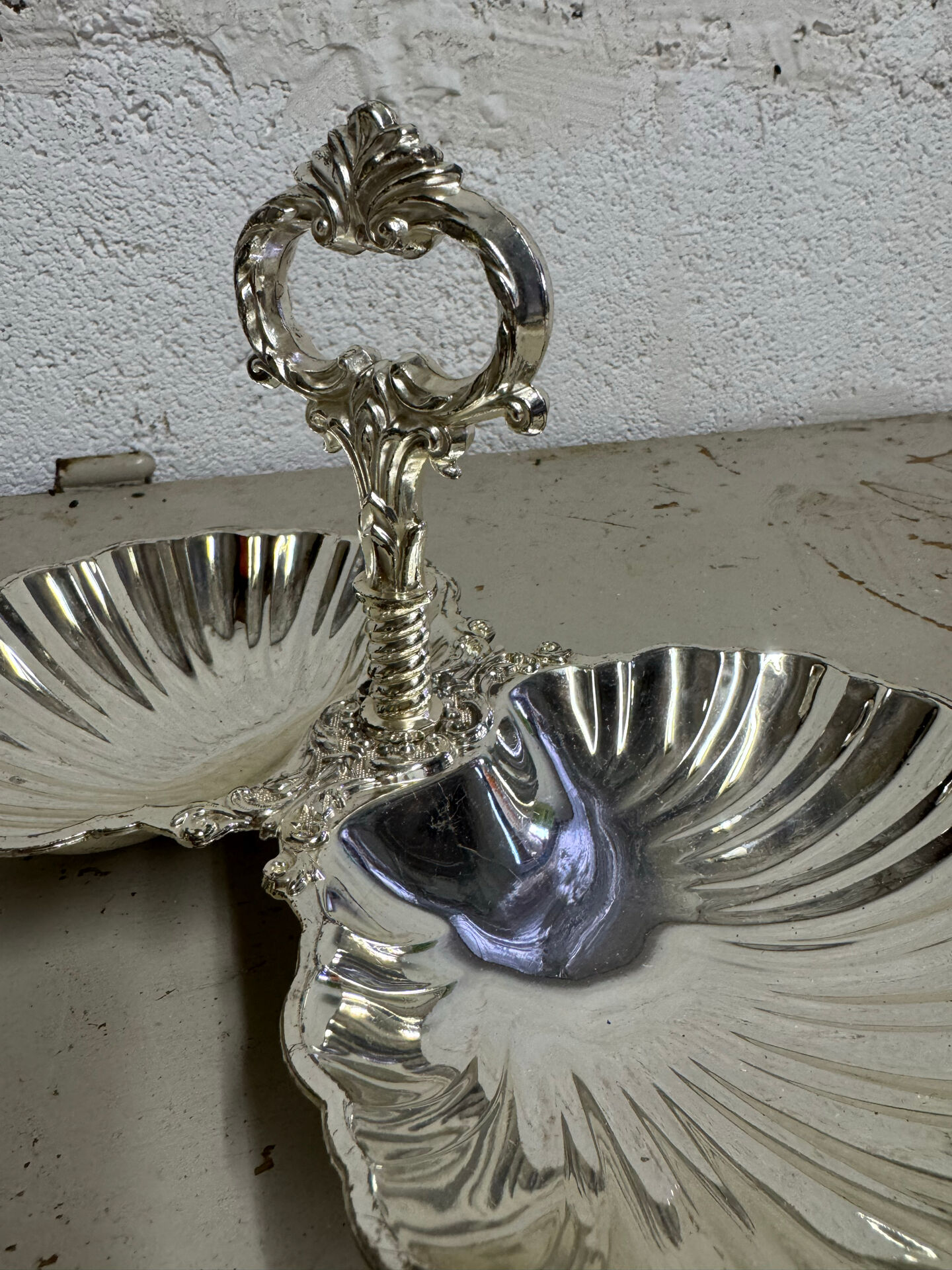 Vintage silver-plated shell display stand