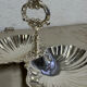 Vintage silver-plated shell display stand