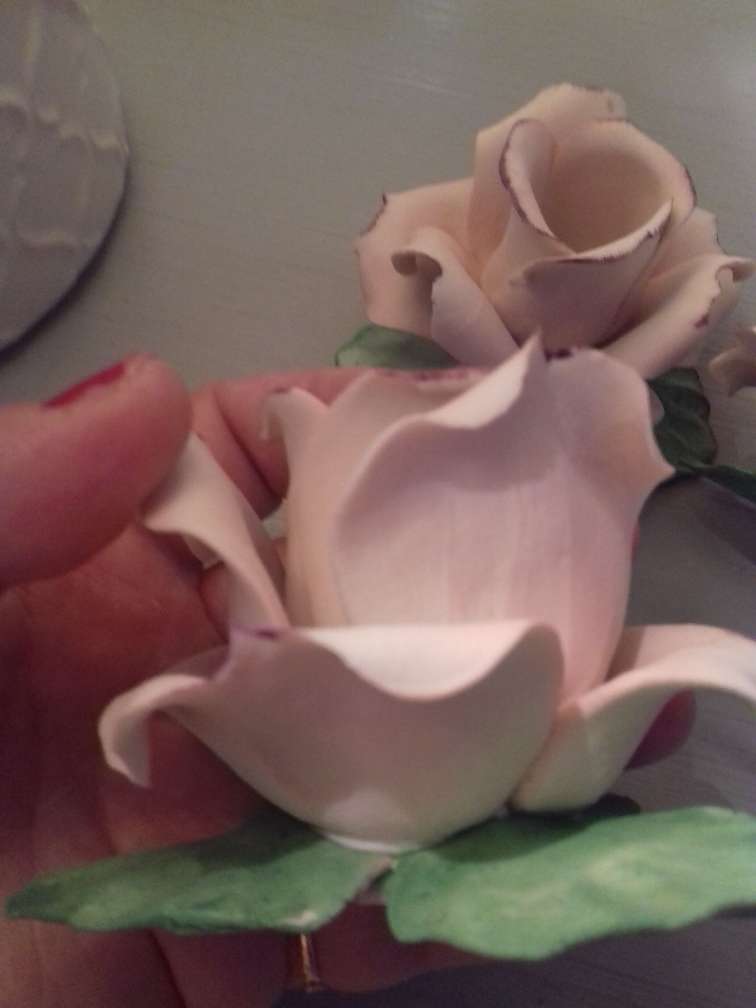 Suite of three omani pink candlesticks