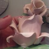 Suite of three omani pink candlesticks