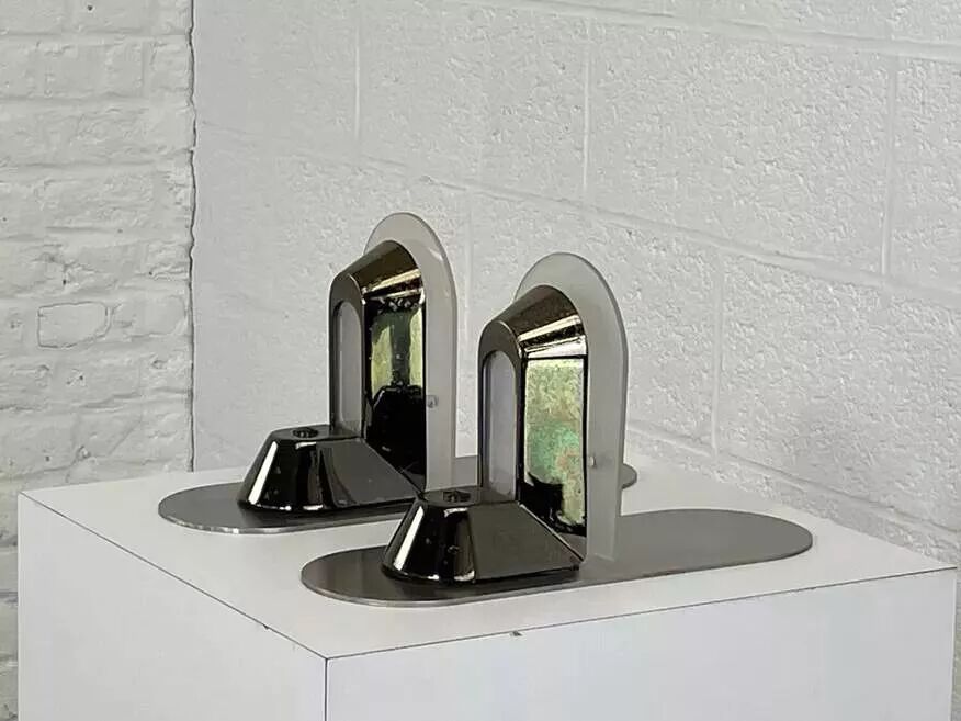 Pair of vintage stainless steel and glass wall lights