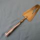 Art Deco pie server silver handle filled with Minerva hallmark.