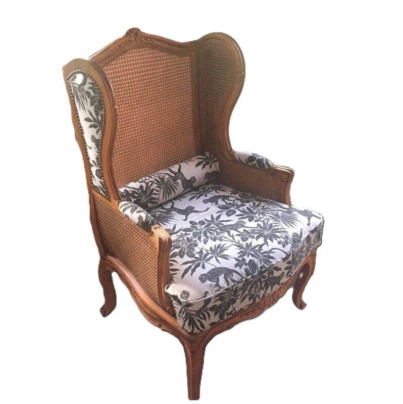 Antique wingback armchair