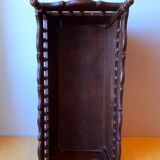 Carved wooden dolls cradle