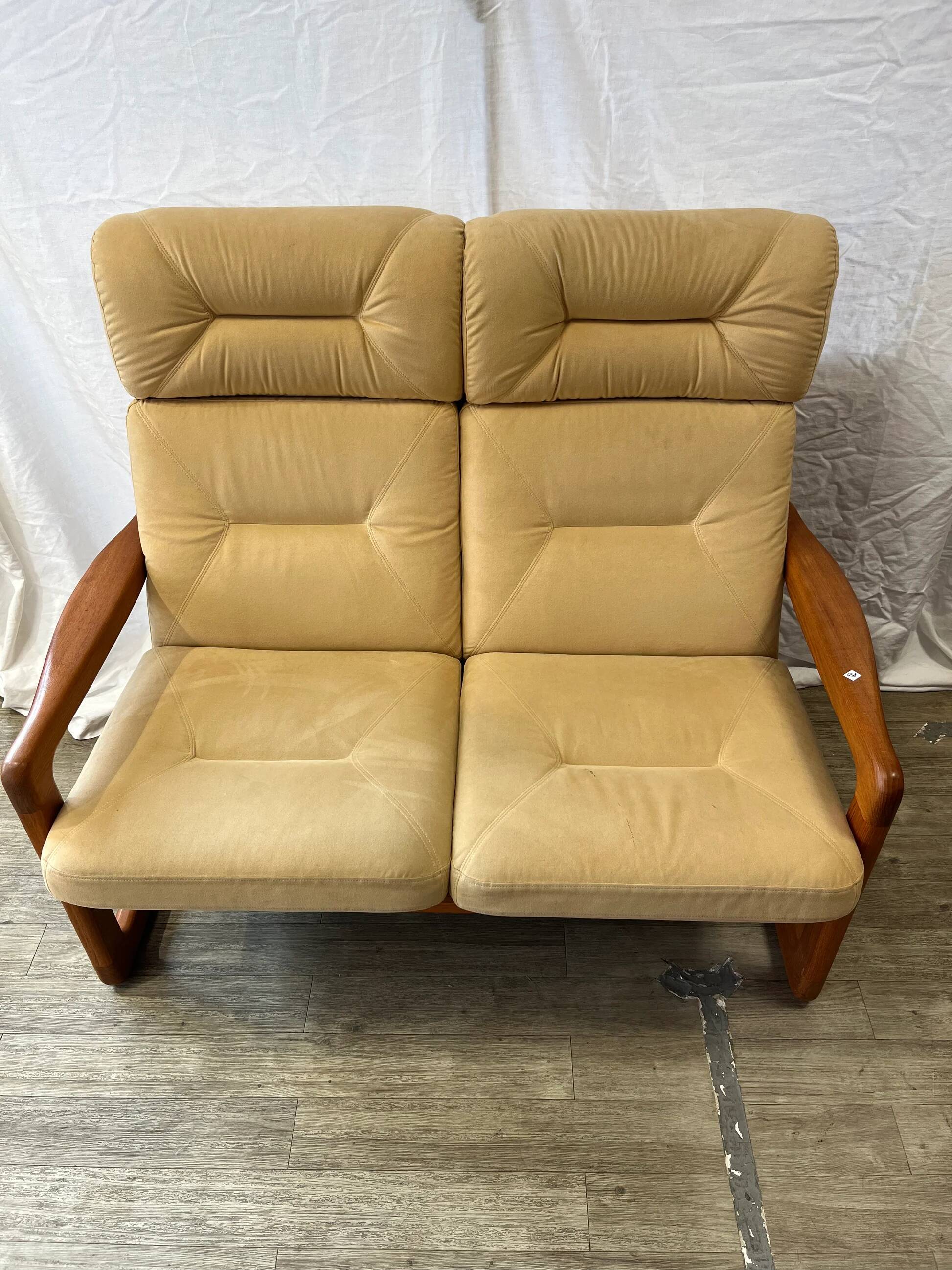 Scandinavian two-seater bench in solid teak and suede from the 1970s.